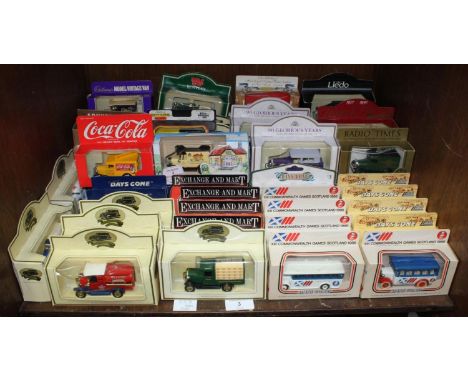 Fifty-eight Lledo scale model vintage cars, including 'Days Gone' 'Exchange &amp; Mart' 'Commonwealth Games 1986,' and variou