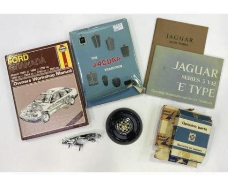 A Jaguar car mascot with original box reading 'Genuine Parts British Leyland', a Jaguar petrol cap and a Jaguar Daimler 'C312