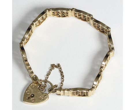 A 9ct gold shaped gate link bracelet, with heart-shaped clasp, gross weight approximately 24.7g 