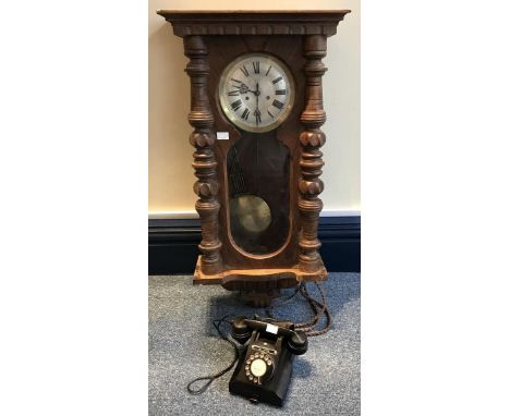 A stained pine Vienna style wall clock with carved pilasters, silvered dial and roman numerals, approx. 93cm (af), together w