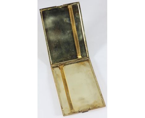 A Continental gold cigarette case, of rectangular form, with engine turned decoration and cabochon onyx thumb piece, internal