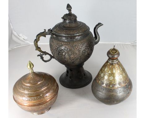 A large 'Afghan' embossed teapot with central infuser, shaped handle and spout, approx. 35cm high, together with a copper dis