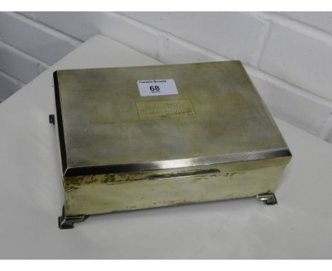 George V silver box with engine turned hinged lid, raised on four out swept supports, with makers mark for William Adams Ltd,