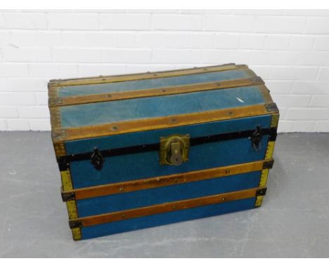 An oak and brass bound domed top storage trunk, 51 x 75cm