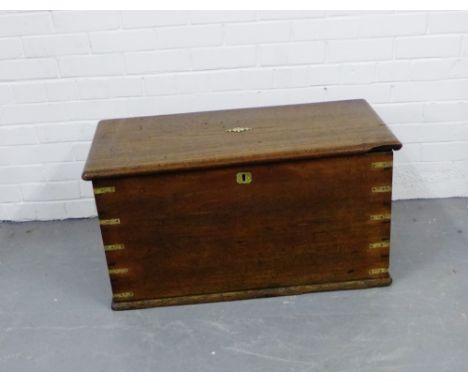 A brass mounted and mahogany storage trunk, 46 x 88cm
