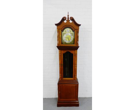 A contemporary Chinese style Grandfather clock with a broken swan neck pediment and brass dial with Roman numerals, with a gl