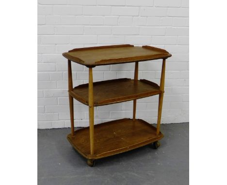 A vintage Ercol light elm three tier trolley, 70 x 72cm