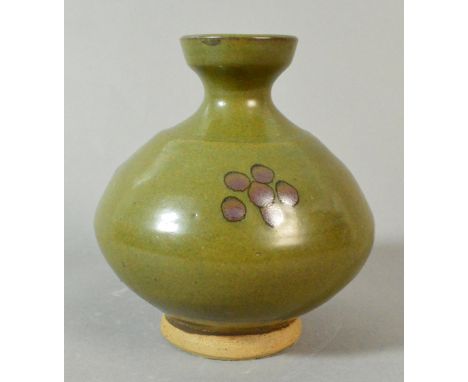 BERNARD LEACH (1887-1979) for Leach Pottery; a stoneware vase of squat form with generous foot ring, olive green glaze with i