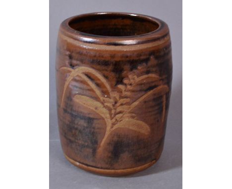 DAVID LEACH (1911-2005) for Lowerdown Pottery; a ribbed cylindrical stoneware vase with wax resist foxglove motif on a khaki 