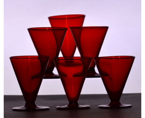 A set of six Art Deco ruby tinted liqueur glasses with conical shaped bowls and folded feet, height 8.2cm. CONDITION REPORT: 