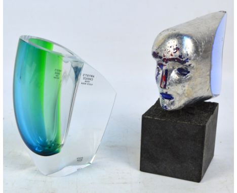 BERTIL VALLIEN for KOSTA BODA; a limited edition Janus Axe Head sculpture with metallic covered blue glass axe head containin