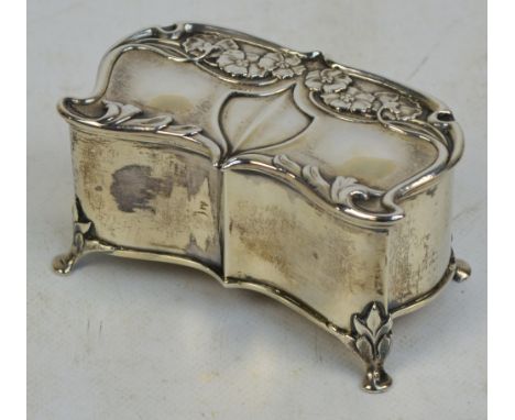 An Art Nouveau late Victorian hallmarked silver trinket box, the hinged lid embossed with stylised floral sprays and raised o