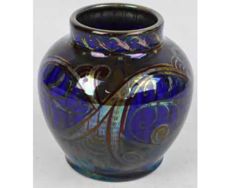 PILKINGTONS LANCASTRIAN; a large slightly ribbed lustre vase with scrolling decoration by Edward Thomas Radford, impressed ma