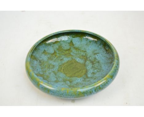 Attributed to ASHBY POTTERS GUILD; a blue glazed pottery bowl possibly designed by Pasco Tunnicliffe, diameter 31.5cm