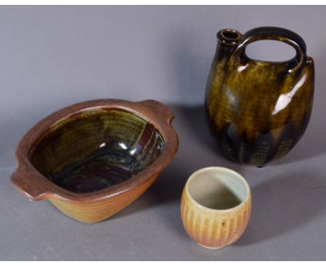 JOHN LEACH (born 1939) for Muchelney Pottery; a stoneware bottle vase covered in olive green and tenmoku glaze, impressed JHL
