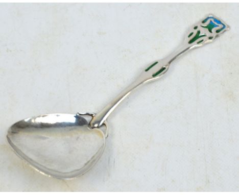 An Arts and Crafts Edwardian hallmarked silver and enamel decorated spoon, with green/blue enamel decorated terminal and pier