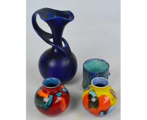 POOLE; two modern globular vases, height approx 10.25cm, a BRETBY blue glazed jug with sweeping handle and a BRETBY trunk for