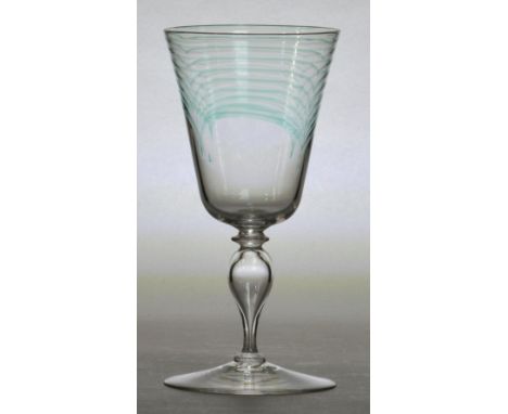 JAMES POWELL WHITEFRIARS; a "Minerbi" goblet designed by Harry Powell with rounded funnel bowl, set with melted glass threads