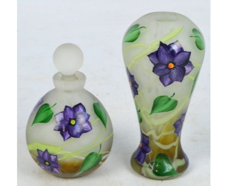 OKRA; a floral enamel painted scent bottle, etched mark to base, and a matching vase, height 13.2cm (2). CONDITION REPORT: Ap