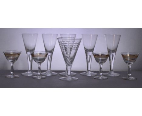 WEBB; a wine glass with etched decoration to the tapering bowl and plain foot, height 15cm, a set of five wine glasses with t