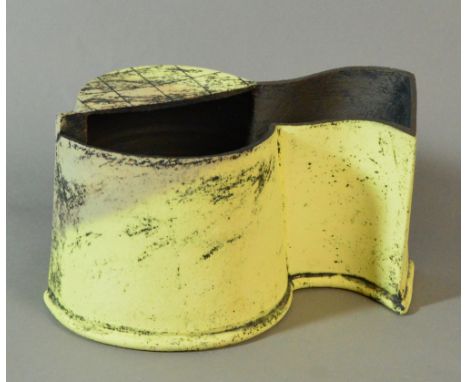JOHN HIGGINS (born 1947); 'Curves in Soft Yellow', a grogged earthenware composite vessel with dry yellow and black surface a