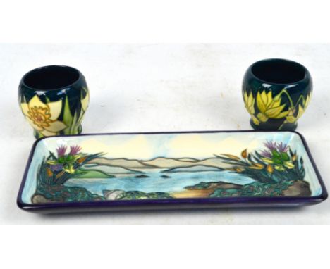 MOORCROFT; a rounded rectangular pin dish decorated with a landscape, impressed marks and signed to base, date 1998, length 2