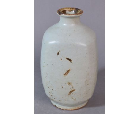 SHIGEYOSHI ICHINO (born 1942) for Leach Pottery; a stoneware squared bottle vase, incised combed decoration on a grey ground,