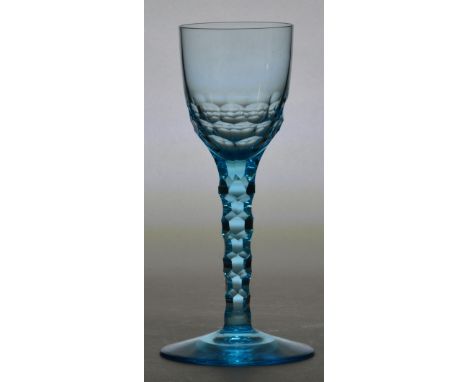 JAMES POWELL WHITEFRIARS; a blue tinted cut sherry glass with part decorated bowl, tapering cut stem and plain foot, height 1