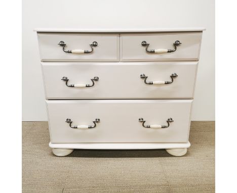 A matching cream finished chest of drawers, 83 x 72 x 47cm.