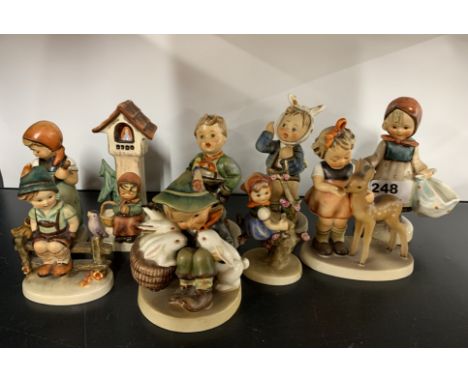 A group of Goebel porcelain figurines, tallest 14cm.