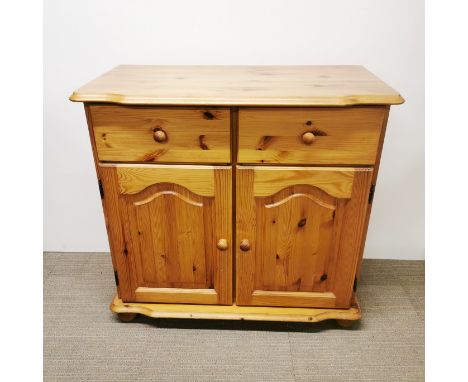 A two drawer pine compact sideboard, 93 x 87 x 47cm.