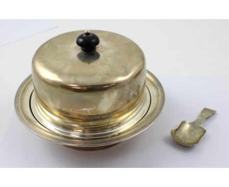 A George V hallmarked silver muffin dish, London 1931, and a Continental silver caddy spoon, approx 20ozt (2).