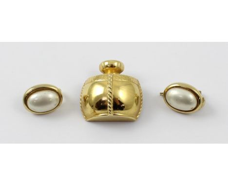 A cased pair of vintage Christian Dior yellow metal and faux pearl earrings, and an Yves St Laurent brooch in the form of the
