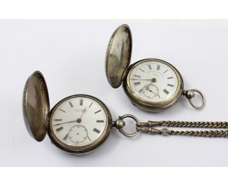 Two Thomas Russell silver full hunter fob watches, the first set with Roman numerals and marked Thomas Russell &amp; Son 8200