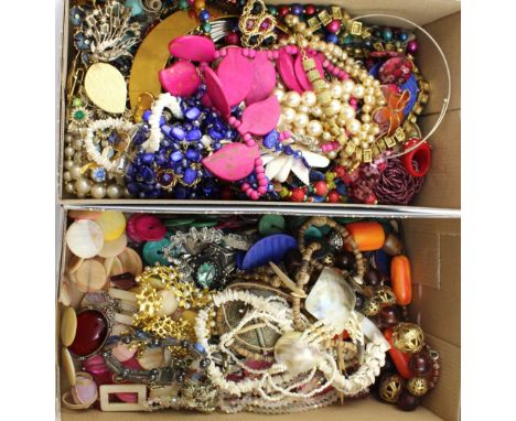 A large quantity of costume jewellery to include contemporary and vintage necklaces, brooches, bracelets, earrings, scarf cli