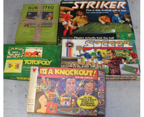 A collection of vintage board games to include 'It's A Knockout', 'Totopoly', Chad valley 'Soccer', 'Striker', and vintage bo