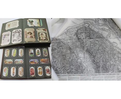 An album containing approximately one hundred early 20th century postcards to include old greetings cards, maritime and topog
