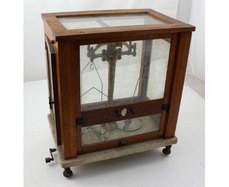 A case set of Paul Bunge scientific balance scales with marble platform base, height 44cm.