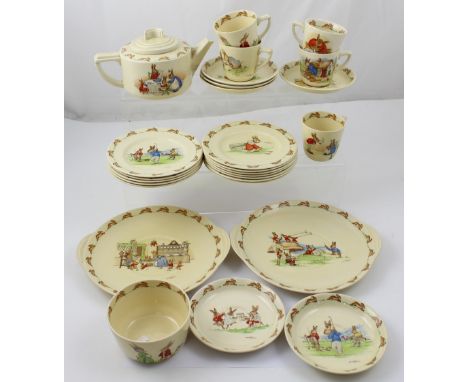 A collection of Royal Doulton 'Bunnykins' ceramics comprising five cups, six saucers, twelve side plates, two sandwich plates