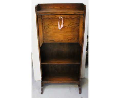 An early 20th century oak students' bureau fitted with pigeonholes and on a single shelf base, height 118.5cm.