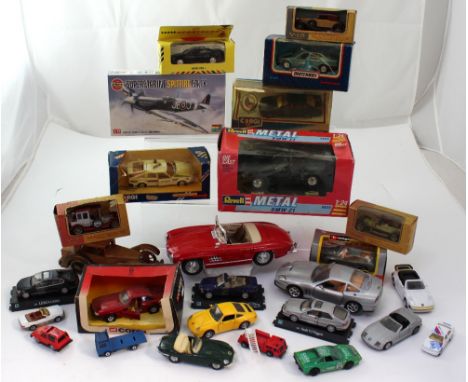 A quantity of diecast and other vehicles to include a boxed Corgi Rover 3.5 Police Car, a boxed Corgi Sports Car, a boxed Rev