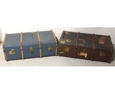 An early 20th century blue travel trunk with bamboo and brass trim, with leather carrying handles, with Italian lettering to 