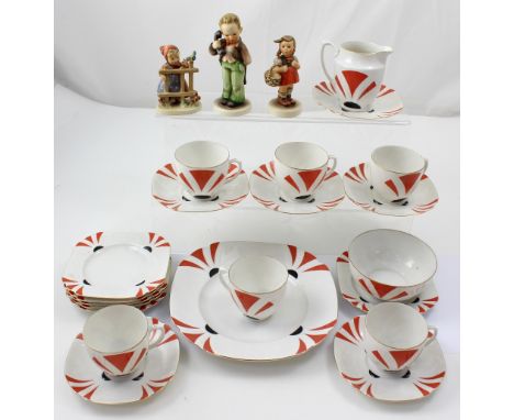 A Czechoslovakian six setting tea service, and three Hummel figures.