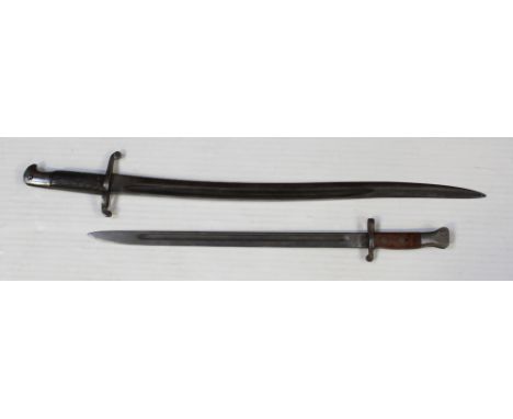 Two bayonets, one a sword bayonet with broad arrow and crown mark over no.33, length 71.5cm, the other with broad arrow mark,