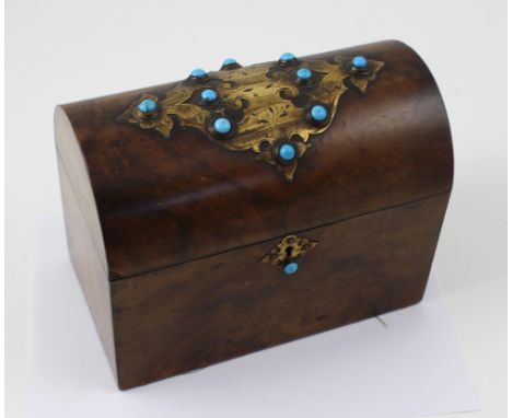 A Victorian walnut and brass bound two division tea caddy of rectangular form set with turquoise cabochon to the domed hinged