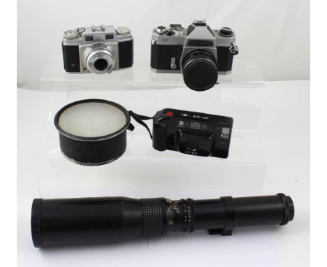 A collection of vintage camera equipment to include a Chinon CS 35mm camera body with Autoflex F 50 lens, a Galaxy 500 F 8.0 