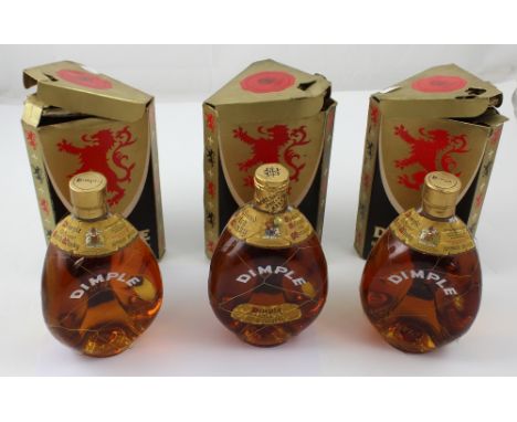 A bottle of Dimple fifteen years old blended Scotch whiskey, one litre, 43%, and two further regular issue bottles, all in ca