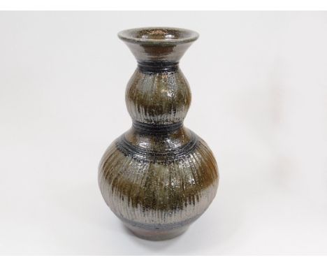 TOMOO HAMADA. A large, sake bottle form vase with incised decoration. Height 30cm. Unmarked. Provenance: purchased from The L