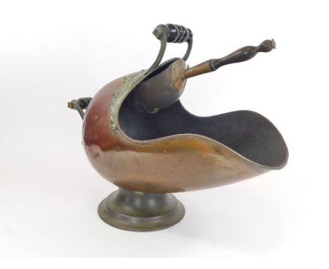 COAL HELMET.A Victorian helmet shaped copper coal scuttle & shovel.