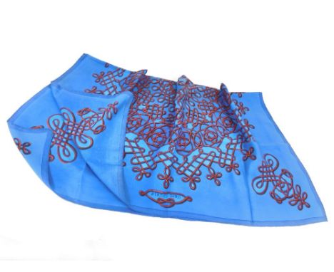 HERMES. A Hermes, Paris silk square with an interlocking red pattern on blue. 85 x 88cm. (Previously owned &amp; possibly a l